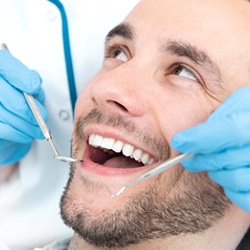 Man visiting his Sagamore Hills implant dentist for a checkup