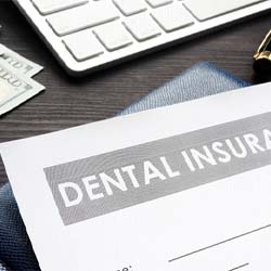 Dental insurance paperwork for the cost of dental implants in Sagamore Hills